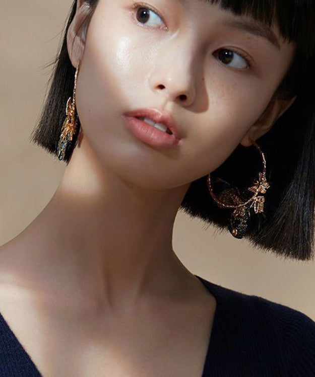 Øreringe med broderede sommerfuglvinger